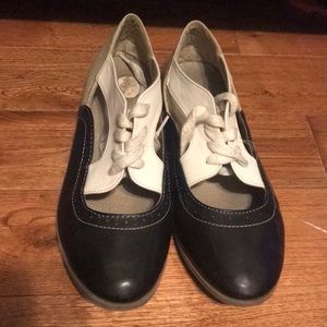 Black, white and beige loafers